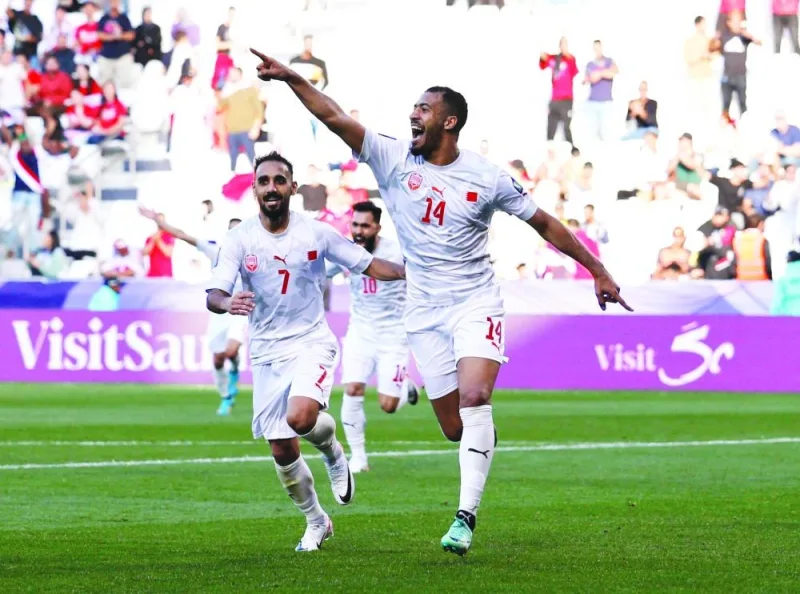 Bahrain’s Abdullah al-Hashash celebrates after scoring on Monday. (Reuters)