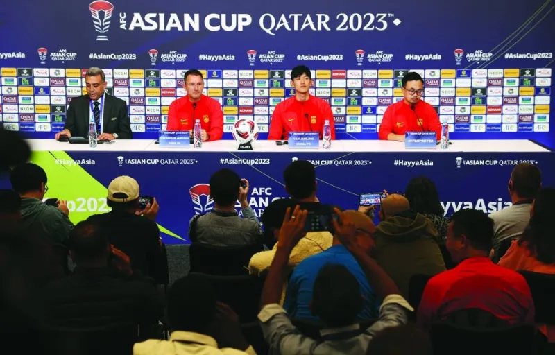 China coach Aleksandar Jankovic and player Wu Lei at a pre-match news conference in Doha on Tuesday.