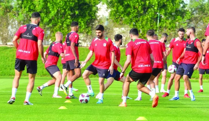 Lebanon players break a sweat during a warm-up session a day ahead of their Asian Cup match against China to be played on Wednesday. (@thelfadotcom)