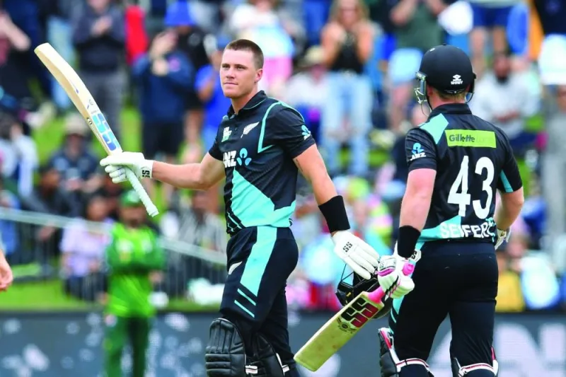 New Zealand’s Finn Allen celebrates after scoring his century during the third T20I against Pakistan in Dunedin on Wednesday. (AFP)