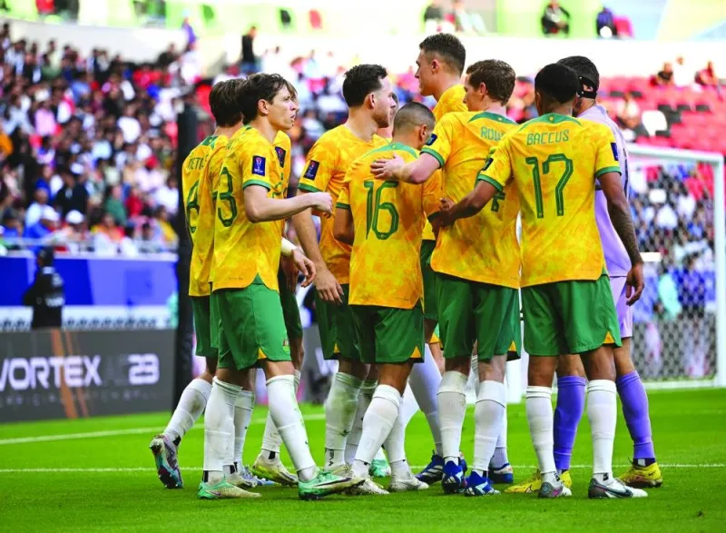 
Australian defender Harry Souttar (fourth right) towers above his players celebrate a goal against India on Saturday at Ahmad Bin Ali Stadium. 