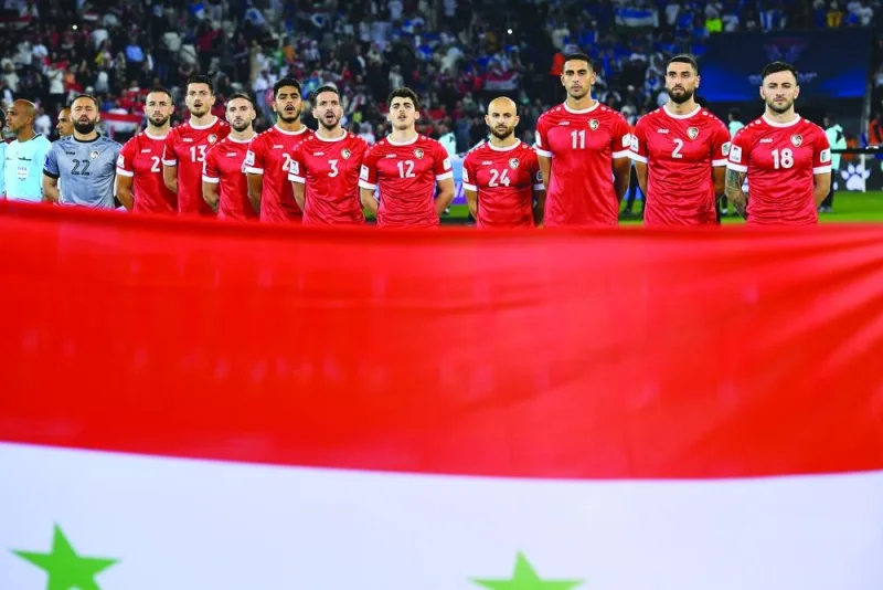 
Syrian national team pose before their match against Uzbekistan. 