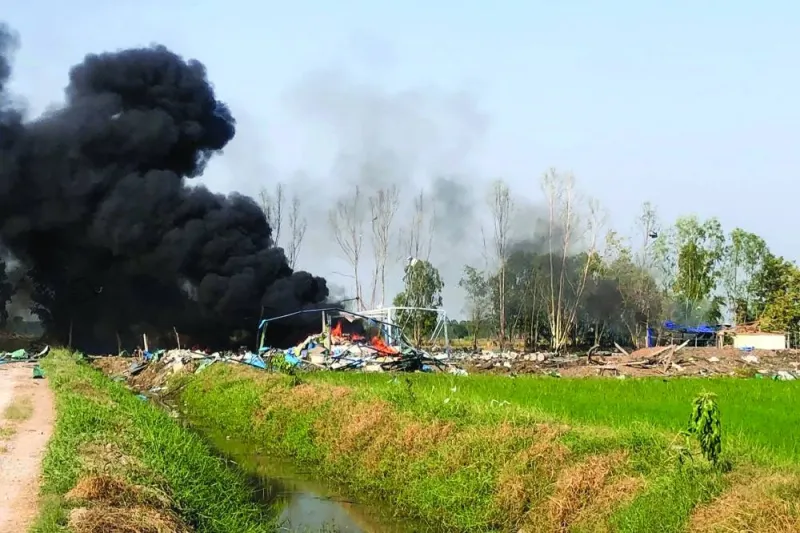 
Smoke rising after an explosion at a fireworks factory near Sala Khao township in Thailand’s Suphan Buri province. 