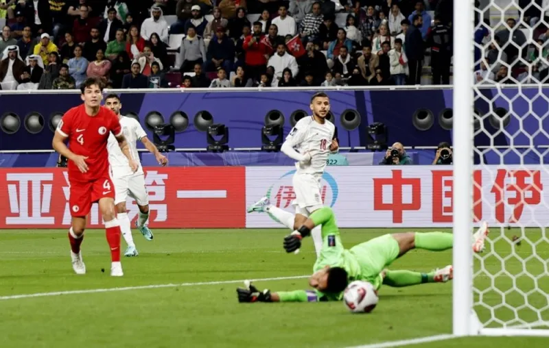 Iran&#039;s Mehdi Ghayedi scores a goal. REUTERS
