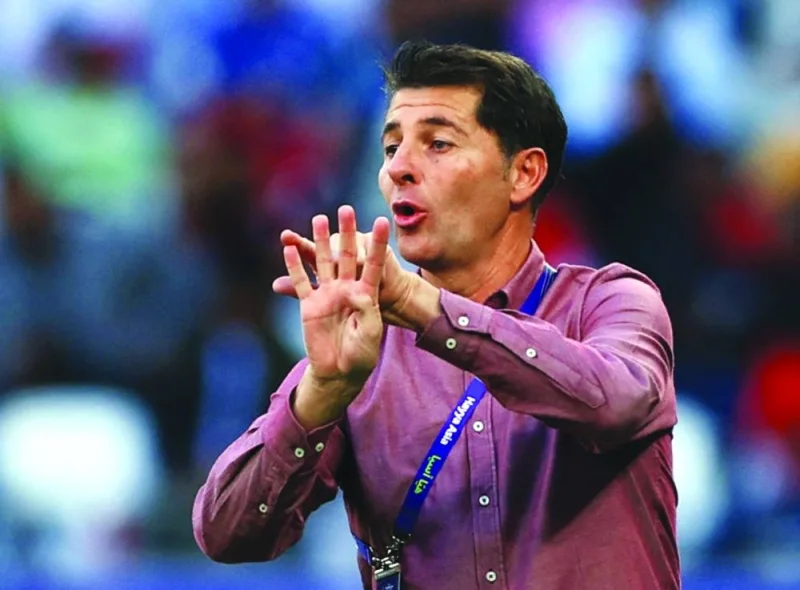Iraq coach Jesus Casas Garcia reacts during the match on Friday.
