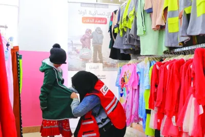 Distribution of winter clothes in Sanaa.