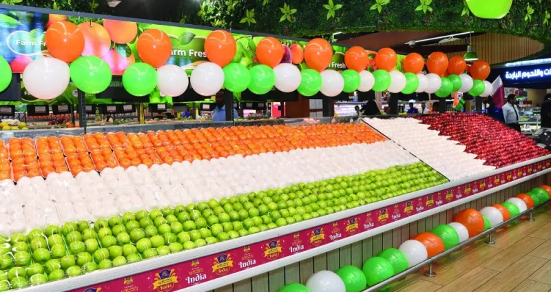 A display of food items in the colours of both Qatar and Indian national flags.