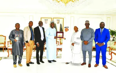 Qatar Chamber acting general manager Ali Saeed bu Sherbak al-Mansouri receiving a token of recognition from Madiou Simpara, president of the Malian Chamber of Commerce and Industry, who led a delegation, which included Ibrahim Ahamadou Toure, a representative of the Ministry of Industry and Commerce, and Cisse Ajita Diaw, vice president of the Mali Chamber of Commerce.