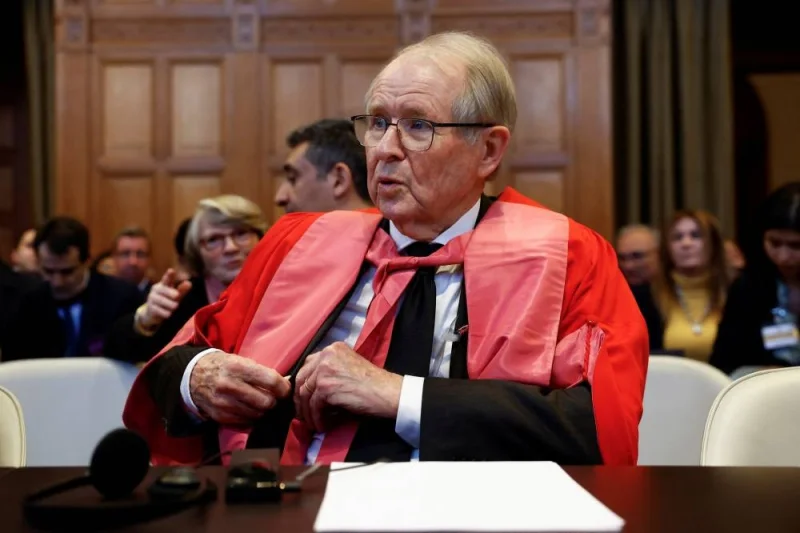 A member of South African legal team John Dugard sits on the day the International Court of Justice (ICJ) rule on emergency measures against Israel following accusations by South Africa that the Israeli military operation in Gaza is a state-led genocide, in The Hague, Netherlands, on Friday. REUTERS