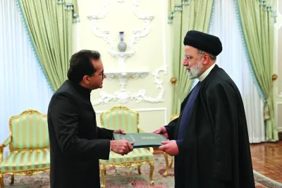 Iranian President Ebrahim Raisi (right) accepting the credentials of Pakistan’s new ambassador Mohamed Mudassir Tipu in Tehran on Saturday. (AFP)