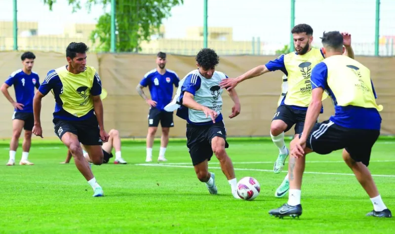 Iraq players train in Al Gharrafa yesterday, ahead of their round of 16 match against Jordan at the Asian Cup.