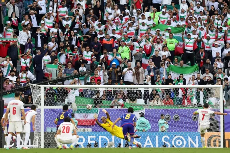 Iran&#039;s midfielder Alireza Jahanbakhsh (R) scores his team&#039;s second goal from the penalty spot. AFP