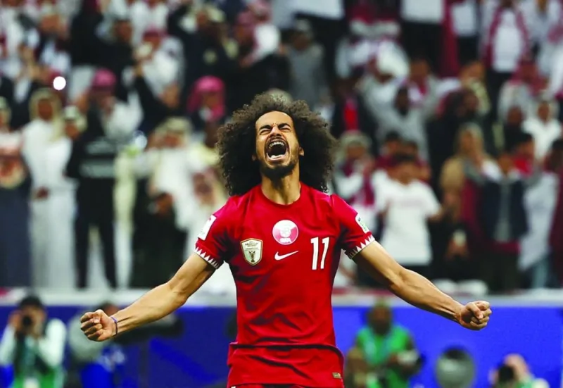 
Qatar’s Akram Afif celebrates scoring a penalty during the shootout. (Reuters) 