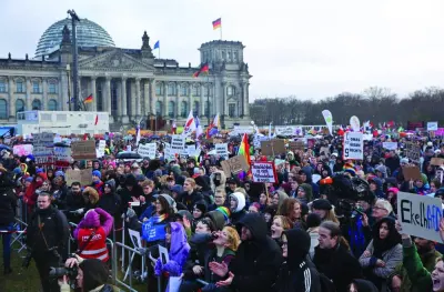
Demonstrators protest against the far-right AfD outside the Reichstag building in Berlin yesterday. (AFP) 