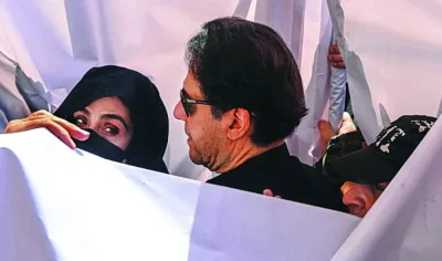 
Former Pakistan prime minister Imran Khan with his wife Bushra Bibi upon their arrival for hearing in a court trial last year. 