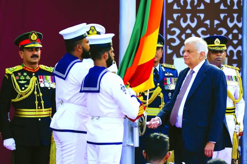 Sri Lankan President Ranil Wickremesinghe (right) hoists the national flag during the Sri Lanka’s 76th Independence Day celebrations at the Galle Face Green in Colombo yesterday.
Sri Lankan President Ranil Wickremesinghe (right) hoists the national flag during the Sri Lanka’s 76th Independence Day celebrations at the Galle Face Green in Colombo yesterday.
