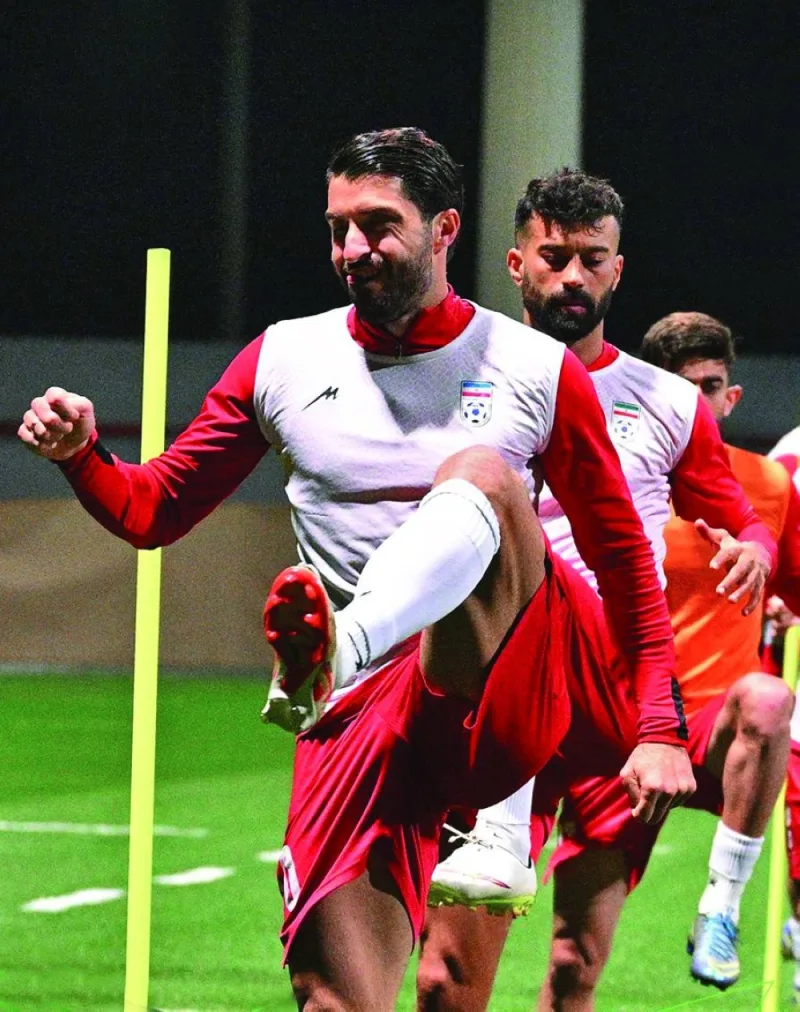 Iran players are seen during a team training session in Doha on Tuesday. Iran face Qatar in the semi-finals of the AFC Asian Cup 2023 at Al Thumama Stadium today. (@afcasiancup)
