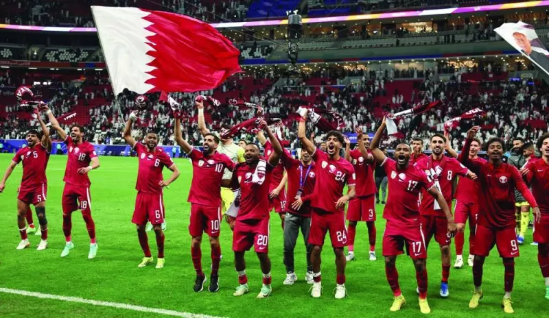 
Qatar players celebrates winning their quarter-final against Uzbekistan. 