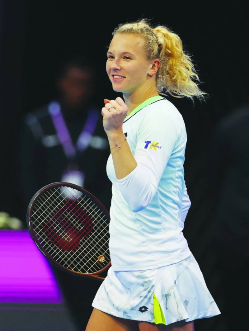 Czech Republic’s Katerina Siniakova celebrates after winning her 
first-round round match against Croatia’s Donna Vekic during day one of the Qatar TotalEnergies Open at Khalifa International Tennis and Squash Complex in Doha yesterday. (Reuters)