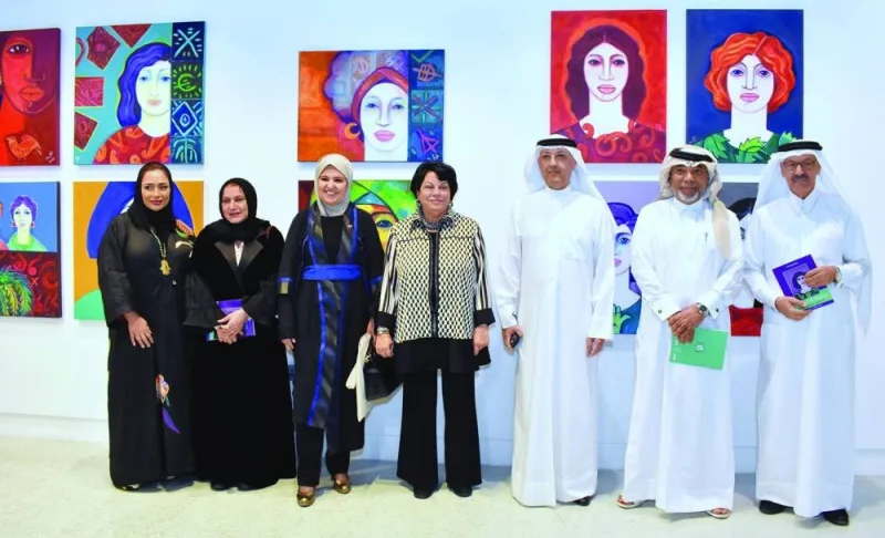 Kuwaiti artist Thuraya al-Baqsami (centre) with Kuwaiti ambassador Khalid Badr al-Mutairi (third right) and other guests at the opening of the exhibition. PICTURES: Thajudheen.