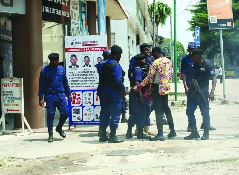 A man argues with a police officer during a protest against Western partners near the United Nations’ Monusco mission headquarters in downtown Kinshasa, DR Congo, yesterday.