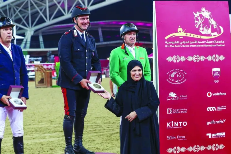 
Dr Eiman al-Ansari, Head of Governmental Relations and Public Affairs at Al Abdulghani Motors, awarded the trophies to podium finishers of CSI5* Two Phases 145cm class. 