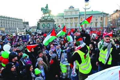 Protestors take part in a demonstration organised by ‘Together for Palestine’ to demand ceasefire and exclude Israel from the Eurovision Song Contest, in Stockholm, Sweden, on Saturday.