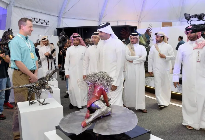 HE the Minister of Culture Sheikh Abdulrahman bin Hamad al-Thani touring the Tadweer (Recycling) Arts Exhibition at Souq Waqif&#039;s western zone Sunday. PICTURE: Shaji Kayamkulam