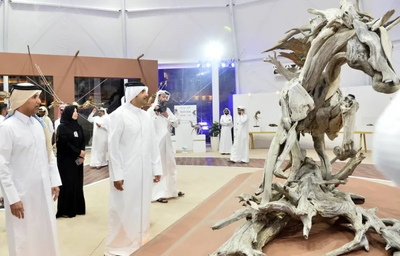 HE the Minister of Culture Sheikh Abdulrahman bin Hamad al-Thani touring the Tadweer (Recycling) Arts Exhibition at Souq Waqif western zone Sunday. PICTURES: Shaji Kayamkulam.