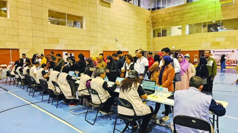Indonesian expatriates in Qatar at a polling station to take part in the overseas general elections.