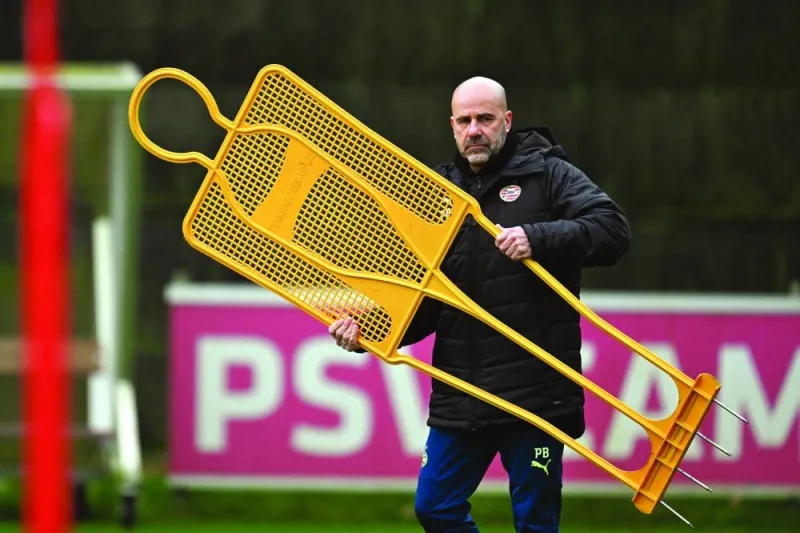 PSV Eindhoven’s head coach Peter Bosz looks on during a training session in Eindhoven on Monday. (AFP)