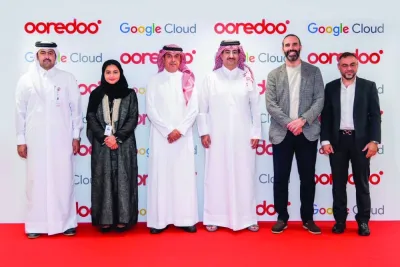 Ooredoo Qatar and Google Cloud officials during the partnership signing ceremony.