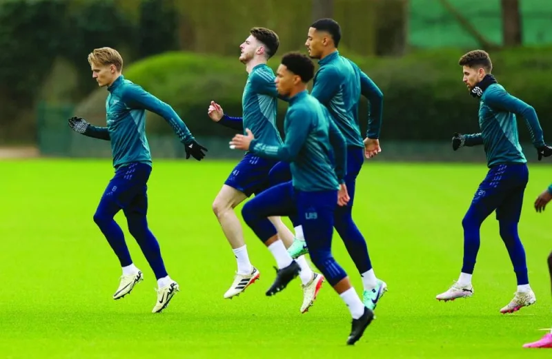 From left: Arsenal’s Martin Odegaard, Declan Rice, Ethan Nwaneri and William Saliba during a training session in London on Tuesday, on the eve of their Champions League match against Porto. (Reuters)
