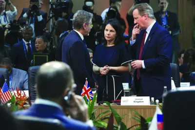 US Secretary of State Antony Blinken (left), German Foreign Minister Annalena Baerbock (centre) and British Foreign Secretary David Cameron watched by Russian Foreign Minister Sergei Lavrov (with mobile in hand) at  the G20 Foreign Ministers’ Meeting at Marina da Gloria in Rio de Janeiro yesterday. (Reuters)