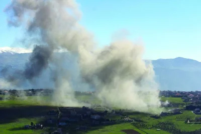 Smoke billows from the site of an Israeli airstrike on the southern Lebanese village of Khiam near the border, yesterday, amid ongoing cross-border tensions.