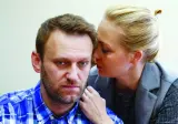 
Russian opposition leader Alexei Navalny and his wife Yulia attend a hearing at the Lublinsky district court in Moscow on April 23, 2015. (Reuters) 