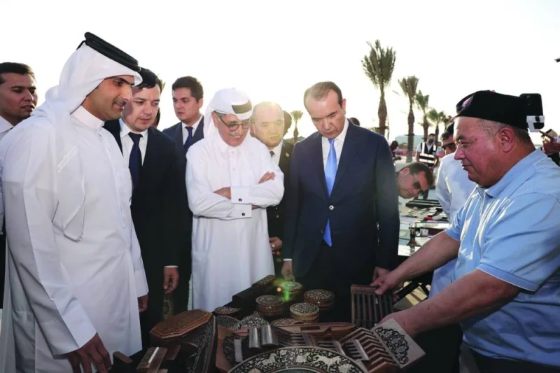 HE the Minister of Culture Sheikh Abdulrahman bin Hamad al-Thani and other dignitaries tour the pavilions of Uzbekistan Cultural Week at Darb Al Saai.