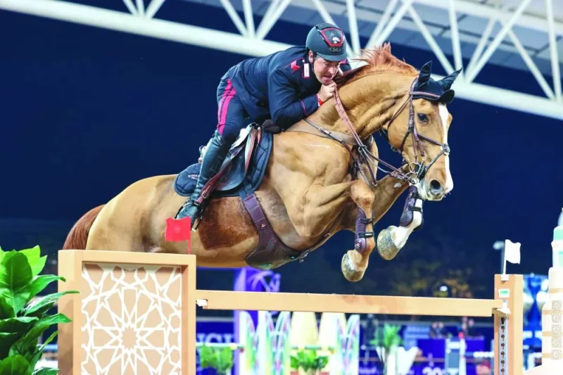 Italy’s Emanuele Gaudiano clears a hurdle with his 15-year-old horse Chalou en route to winning the CSI5* 1.55m class at the CHI Al Shaqab on Friday.