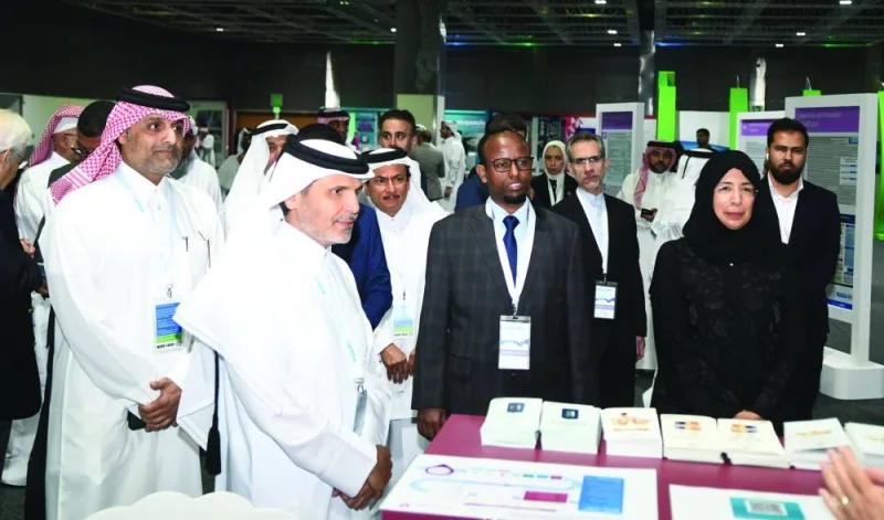 HE Dr Hanan Mohamed Al-Kuwari, Minister of Public Health, and other dignitaries touring the poster presentation at the forum. PICTURE: Shameer Rasheed
