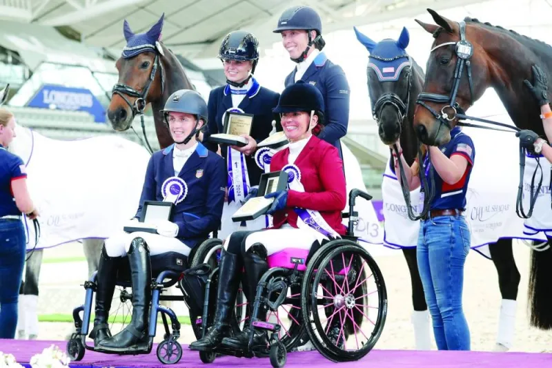
Winners of the Para Dressage Freestyle events Kate Shoemaker, Claire Overweg, Fiona Howard and Maud Haarhuis pose with their medals. 