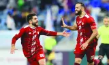 
Al Markhiya’s Driss Fettouhi (right) celebrates with Mohamed al-Abbasi after scoring against Al Wakrah during the Expo Stars League match at the Al Janoub Stadium. 