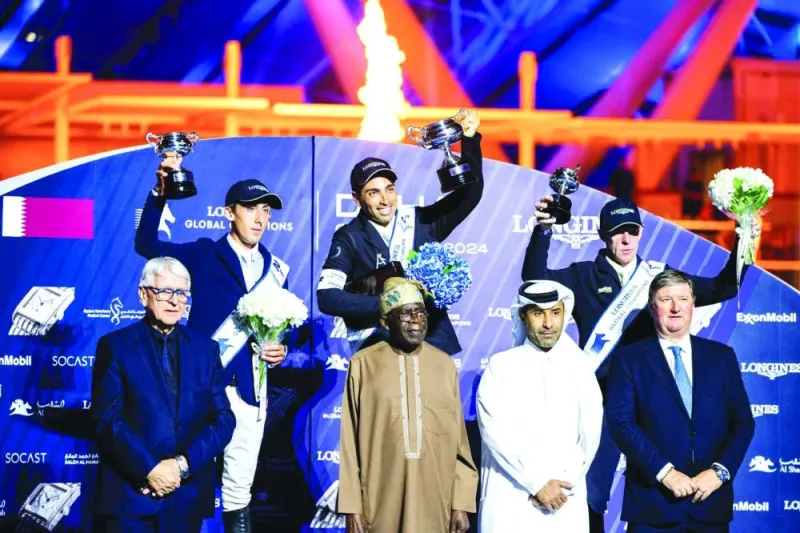 The Global Champions Tour Grand Prix of Doha winner Abdel Said, runner-up Harry Allen, third-placed Marcus Ehning pose with President of Nigeria Bola Ahmed Tinubu, Member of the Board of Directors at Al Shaqab Rashid bin Nasser Sraiya al-Kaabi and the event president Jan Tops at the podium ceremony at Al Shaqab on Saturday.
