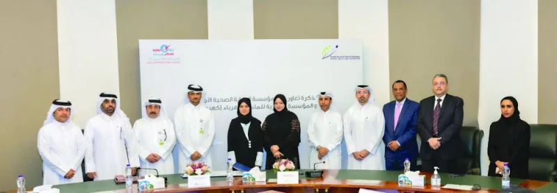 Kahramaa&#039;s Dr al-Wahidi and PHCC&#039;s Dr al-Abdulla and other officials at the signing ceremony.