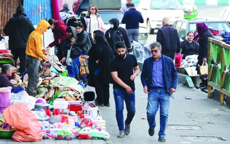 People walk along a street in Tehran on Sunday, two days after Iranians voted in the country’s parliamentary election. People walk along a street in Tehran on Sunday, two days after Iranians voted in the country’s parliamentary election.