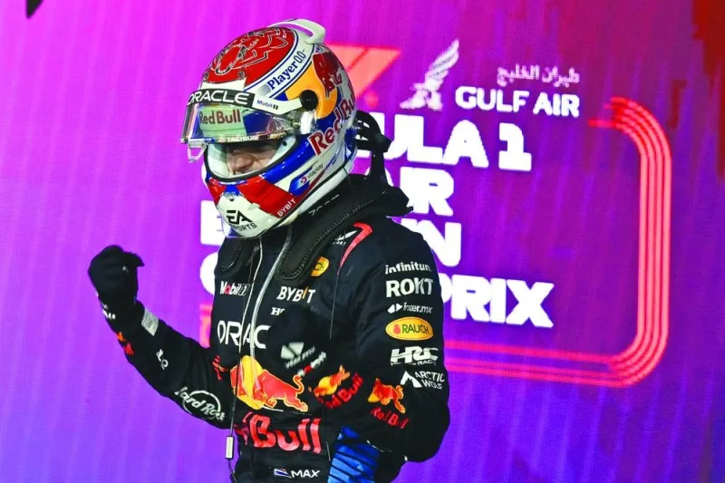 Red Bull Racing’s Dutch driver Max Verstappen celebrates winning the Bahrain Grand Prix at the Bahrain International Circuit in Sakhir on March 2, 2024. (AFP)