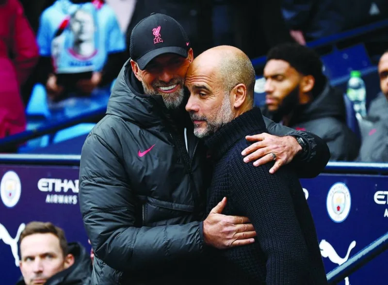 
Jurgen Klopp (left), stepping down as Liverpool boss at the end of the season, has a winning record against Pep Guardiola – coming out on top 12 times against 11 in their 29 meetings. 