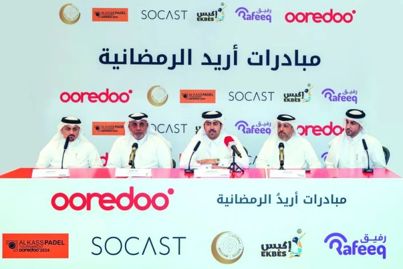 Al-Kuwari with representatives of Ooredoo&#039;s partners during the launch of the ‘Endless Giving’ campaign.