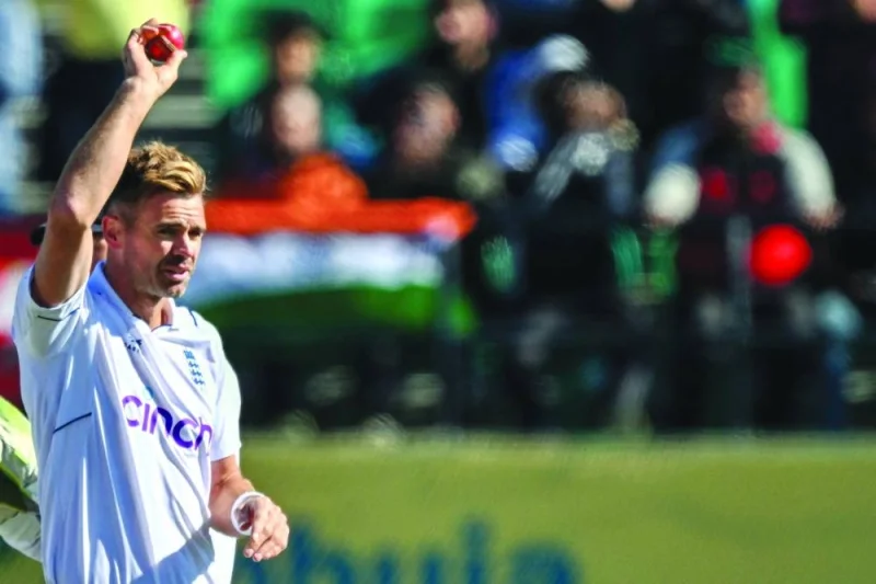 James Anderson gestures after taking his 7007th Test wicket in Dharamsala on Saturday. (AFP)
