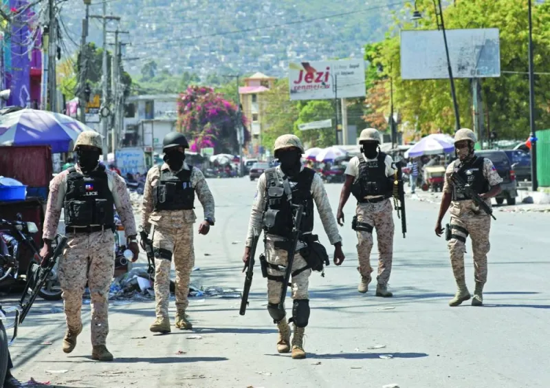 
Police patrol a street in Port-au-Prince after authorities extended the state of emergency amid gang violence that has threatened to bring down the government, forcing thousands to flee their homes. 