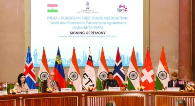 Piyush Goyal (second right), India’s minister of commerce and industry, consumer affairs, textiles, food and public distribution addresses  diplomats at the signing ceremony of Trade and Economic Partnership Agreement between India and European Free Trade Association in New Delhi.
